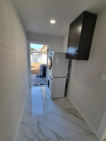 a view of a livingroom with wooden floor