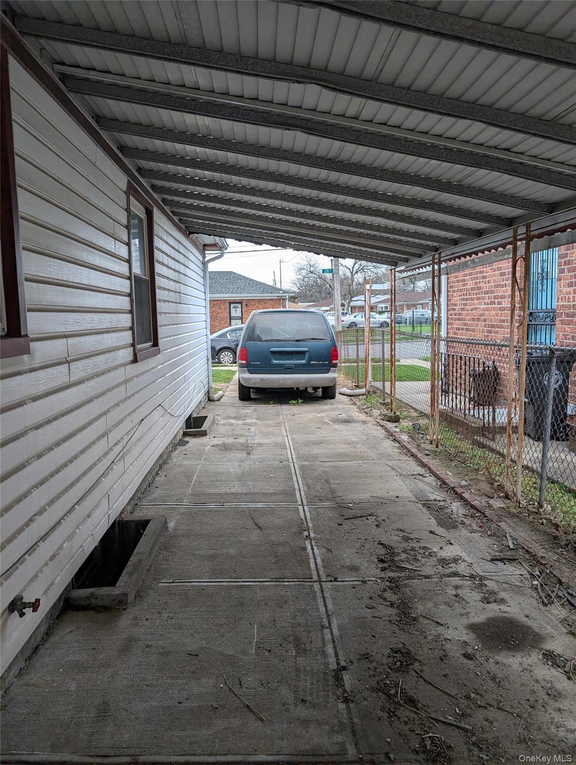 143-47 228th Street Queens, NY 11413 - Photo 12 of 18 a view of a backyard with sitting area