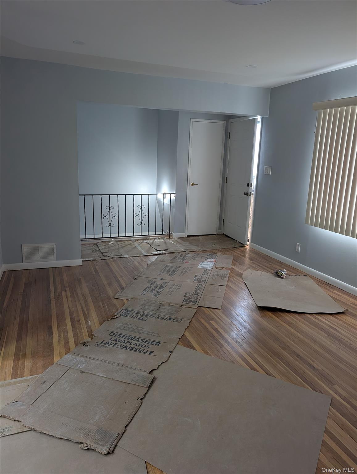 143-47 228th Street Queens, NY 11413 - Photo 16 of 18 a view of a livingroom with wooden floor