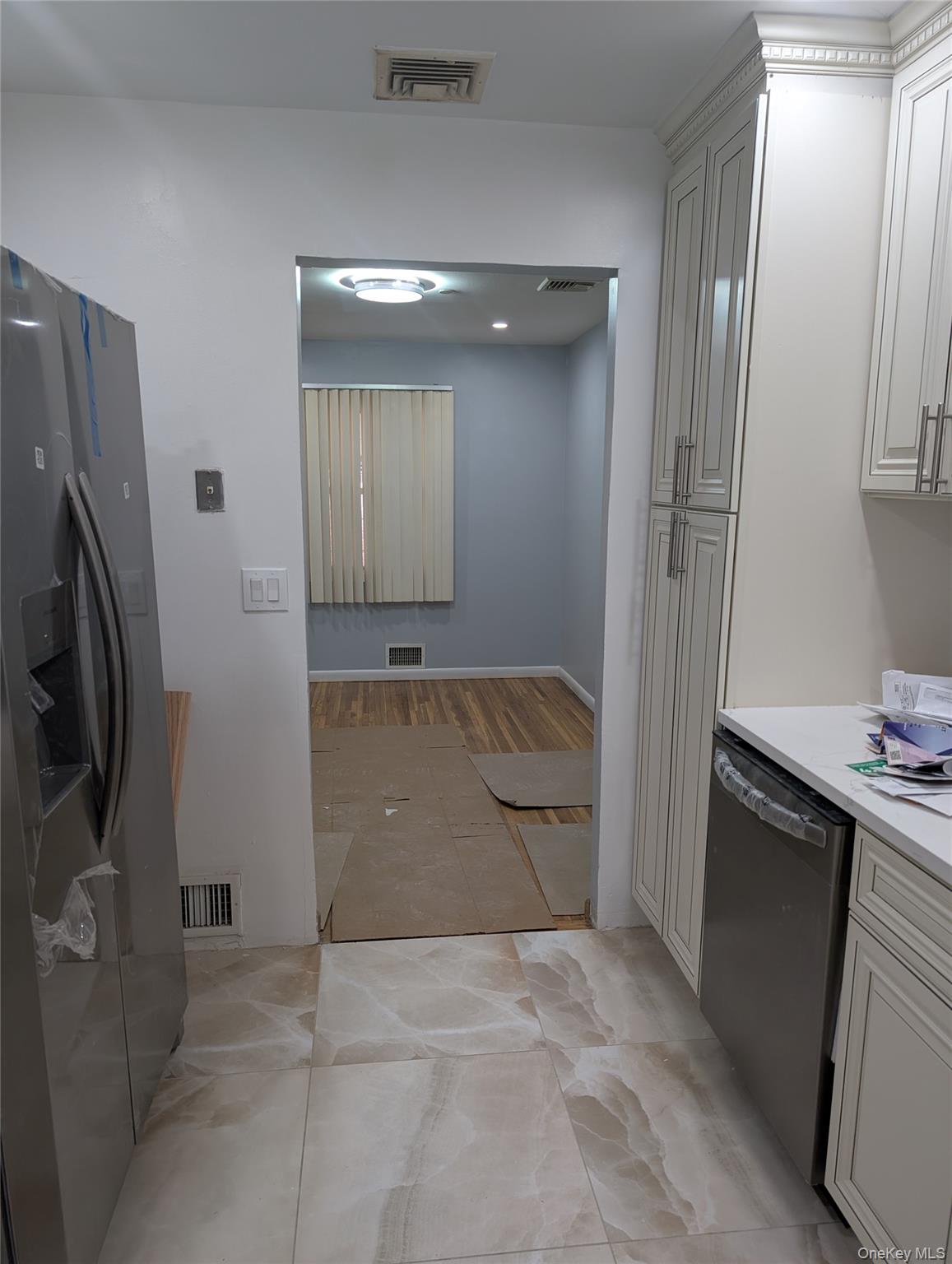143-47 228th Street Queens, NY 11413 - Photo 10 of 18 a bathroom with a granite countertop sink a toilet and shower