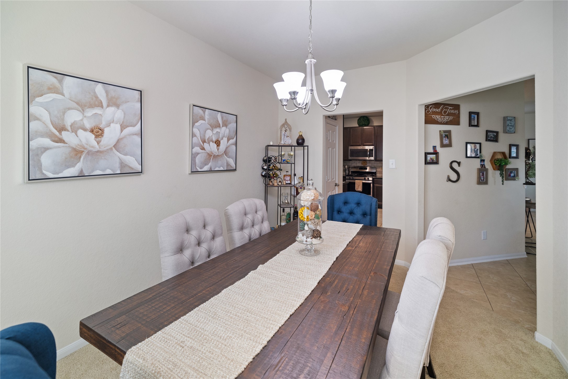 14906 Rustler Gate Lane Cypress, TX 77433 - Photo 9 of 30 a bedroom with furniture and a chandelier