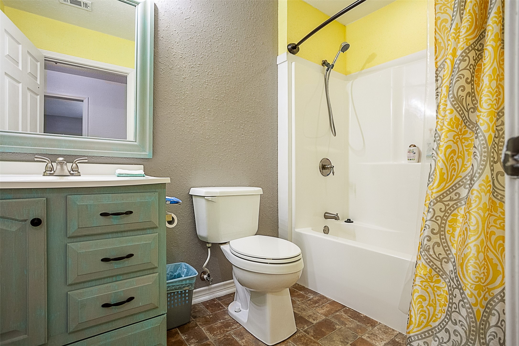 2704 62nd Street Port Arthur, TX 77640 - Photo 13 of 30 a bathroom with a sink toilet and shower