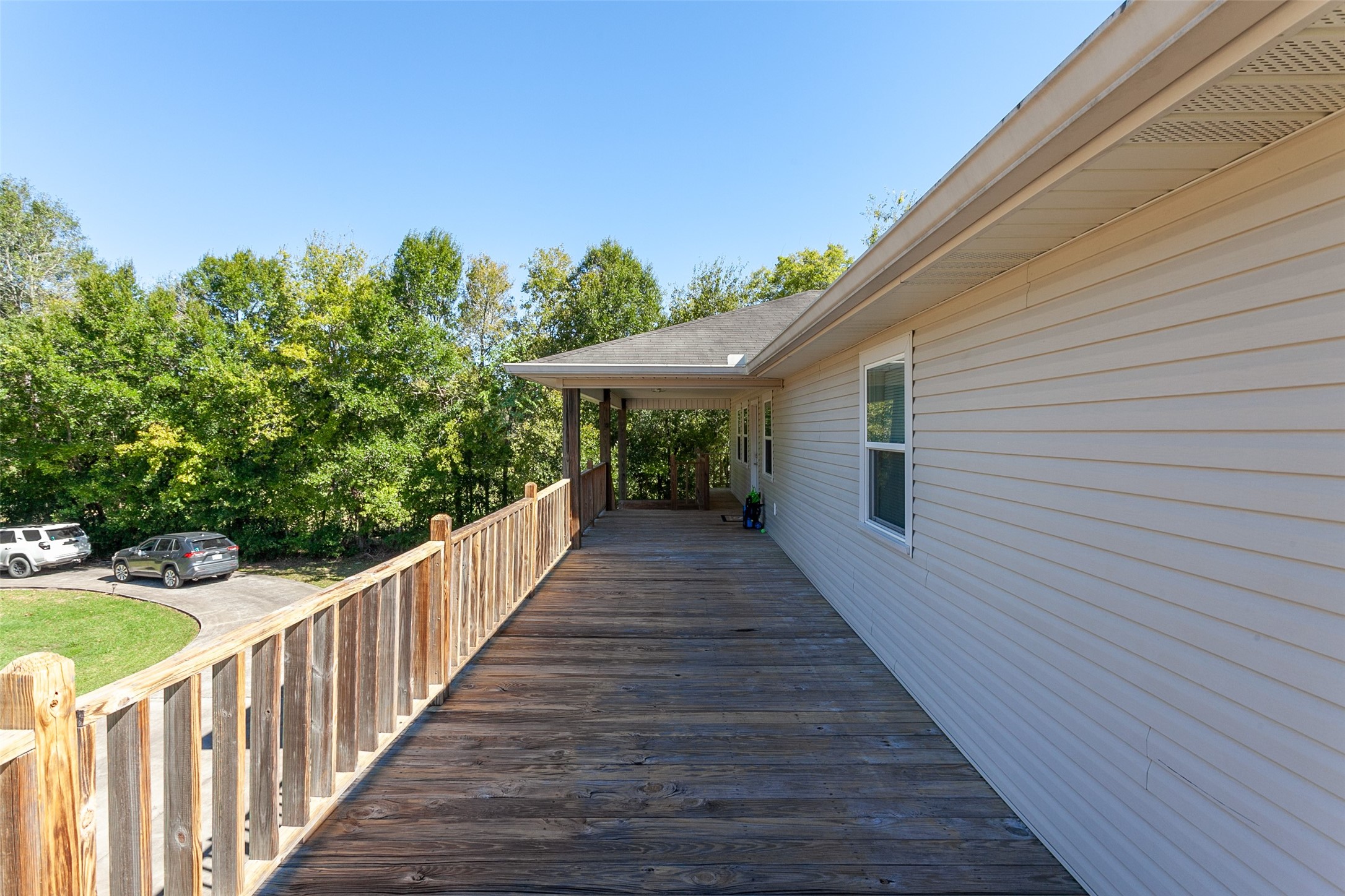 2704 62nd Street Port Arthur, TX 77640 - Photo 20 of 30 a view of a house with wooden deck