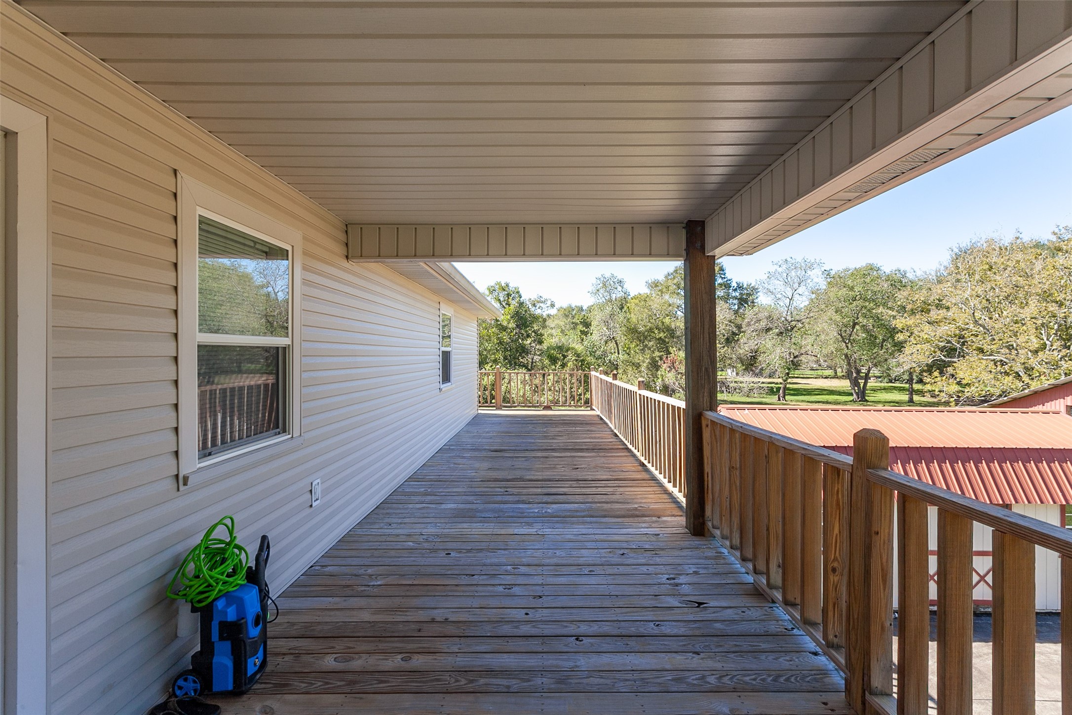 2704 62nd Street Port Arthur, TX 77640 - Photo 21 of 30 a view of a porch with wooden floor