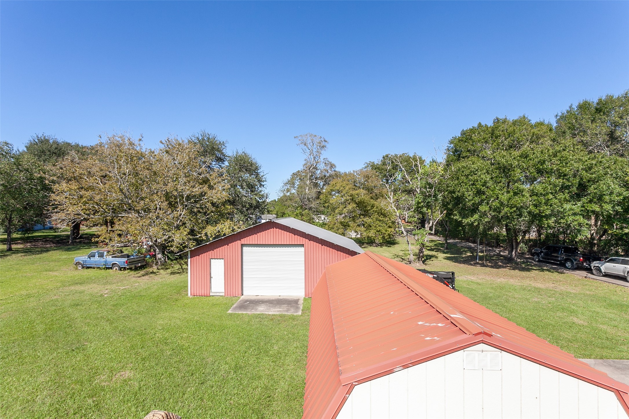 2704 62nd Street Port Arthur, TX 77640 - Photo 24 of 30 a view of a yard with a house in the background