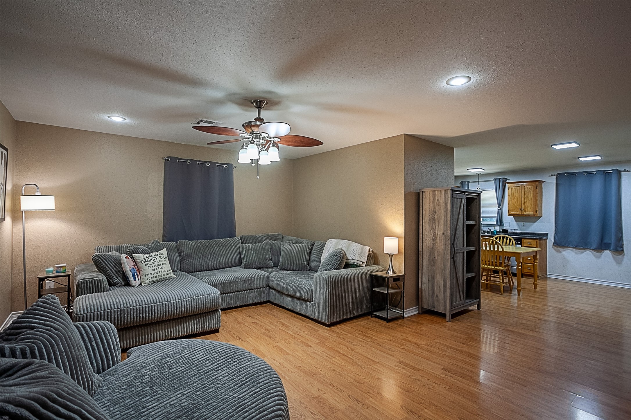 2704 62nd Street Port Arthur, TX 77640 - Photo 4 of 30 a living room with furniture and kitchen view