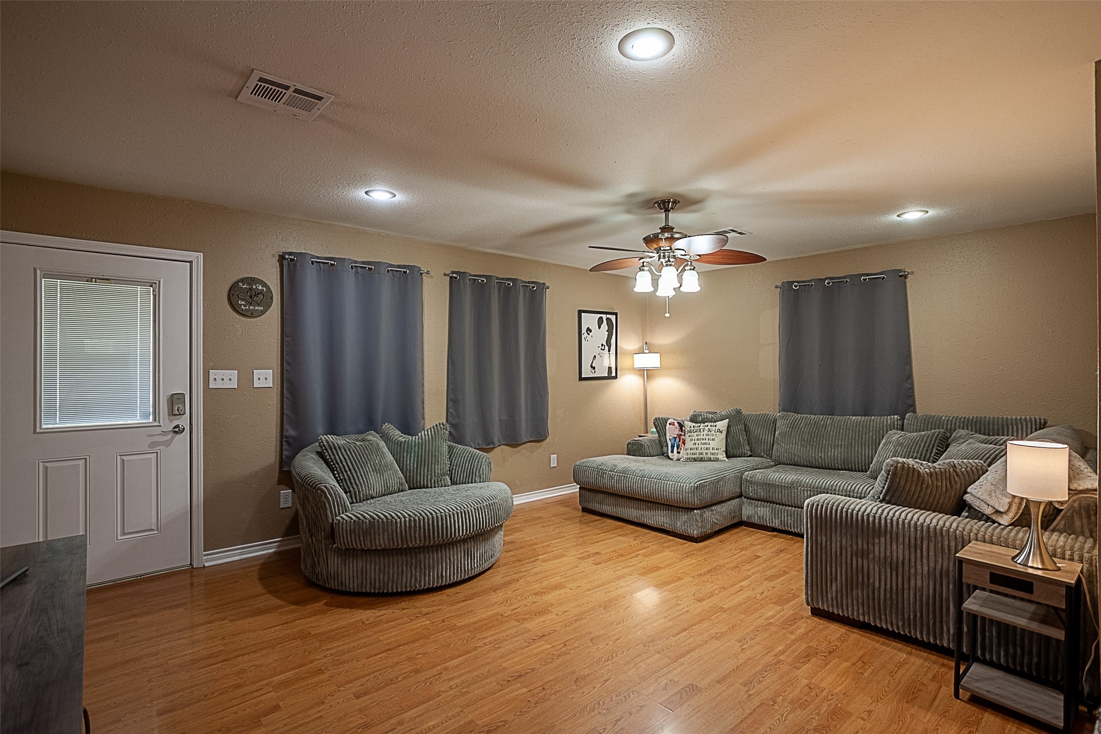 2704 62nd Street Port Arthur, TX 77640 - Photo 5 of 30 a living room with furniture and wooden floor