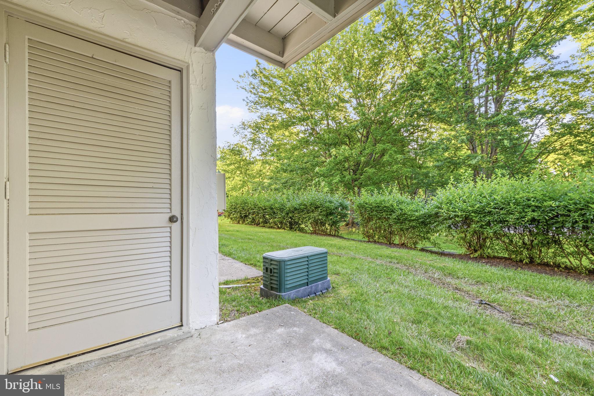 5817 Rexford Drive, Unit 798 Springfield, VA 22152 - Photo 18 of 23 a view of a back yard from a corridor