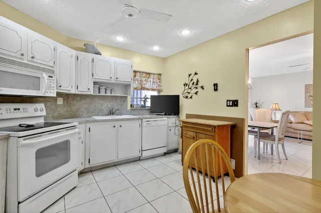 $129,900 | 6 Greenway Village North, Unit 210, Royal Palm Beach, FL 33411