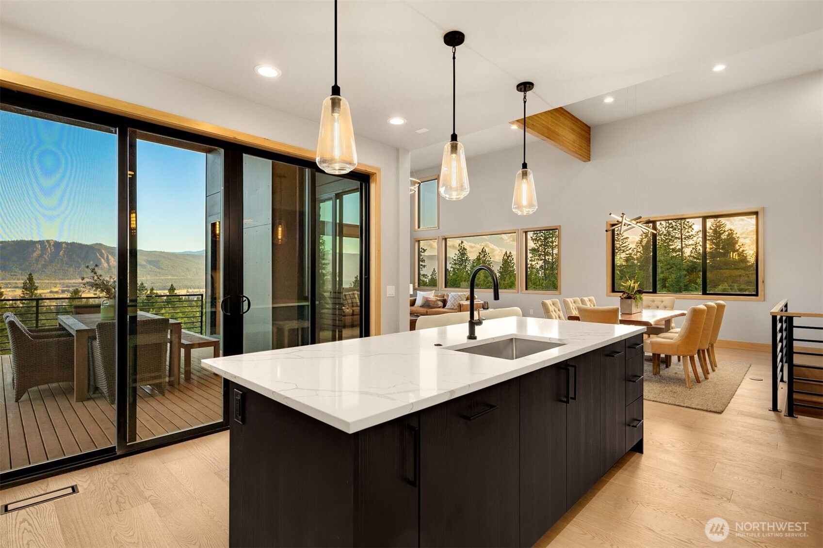1721 Forest Ridge Drive Cle Elum, WA 98922 - Photo 17 of 33 a dining hall with stainless steel appliances granite countertop a sink a counter space and a view of living room with furniture
