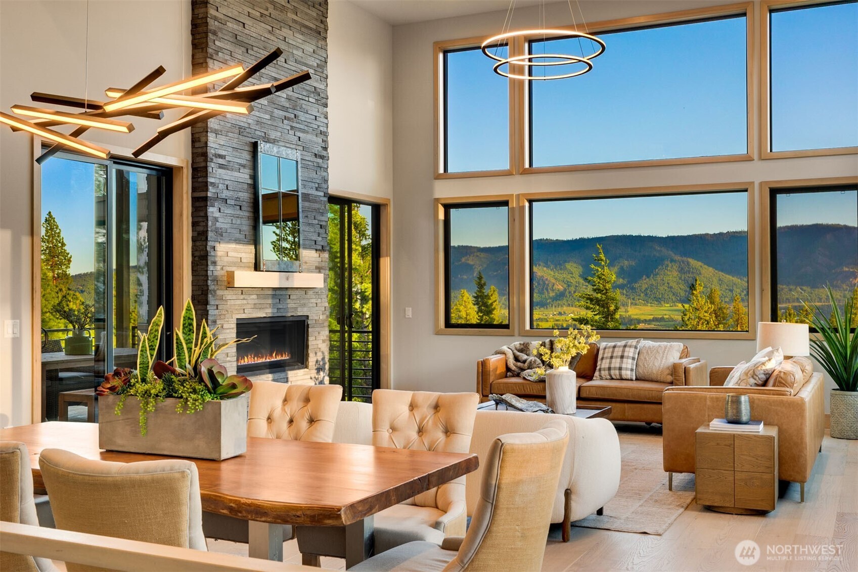 1721 Forest Ridge Drive Cle Elum, WA 98922 - Photo 2 of 33 a living room with furniture and a floor to ceiling window