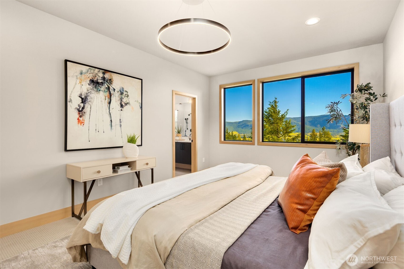 1721 Forest Ridge Drive Cle Elum, WA 98922 - Photo 24 of 33 a bedroom with a bed and a painting on the wall