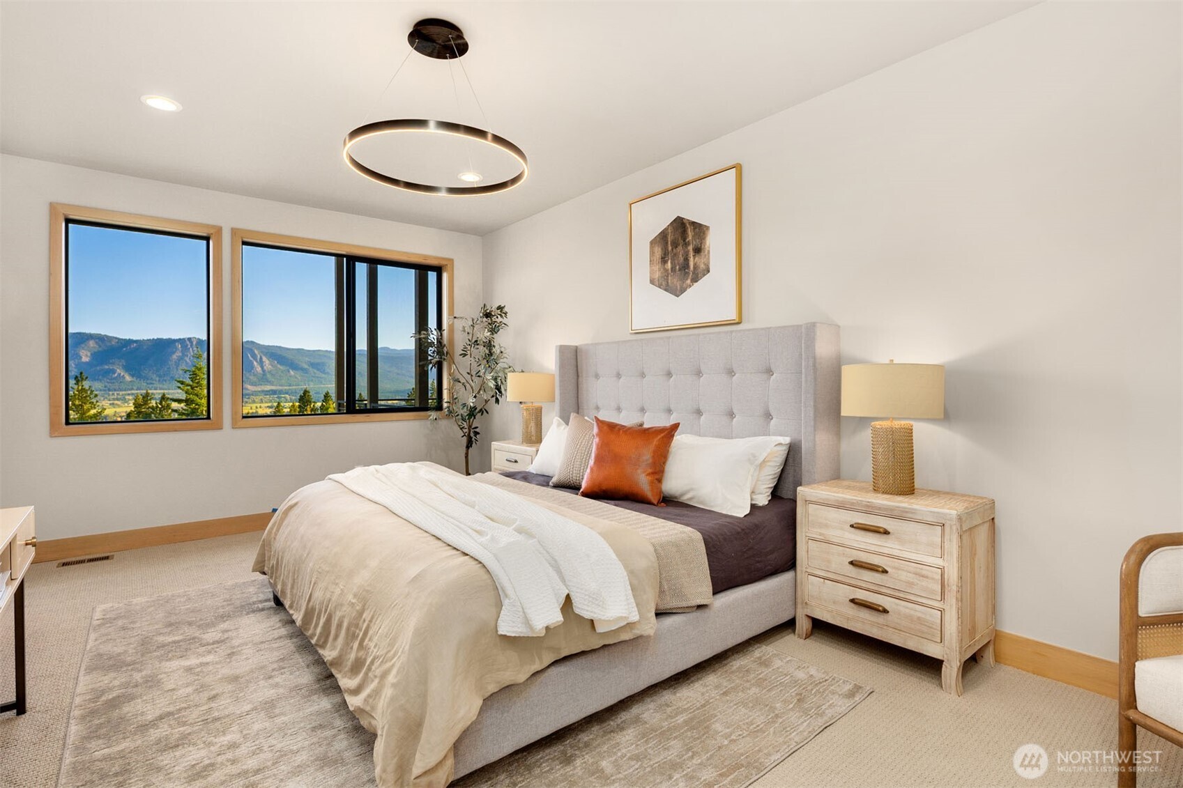 1721 Forest Ridge Drive Cle Elum, WA 98922 - Photo 25 of 33 a bedroom with a bed and a large window