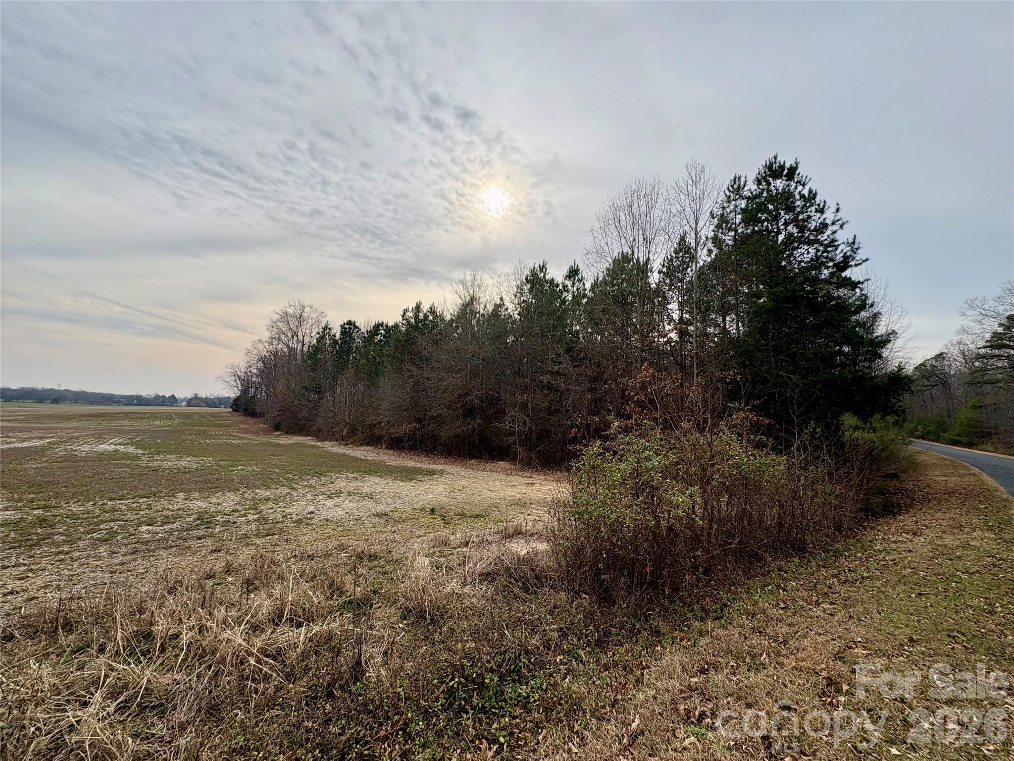 2734 L J Whitley Road Monroe, NC 28112 - Photo 5 of 7 a view of a field with an ocean