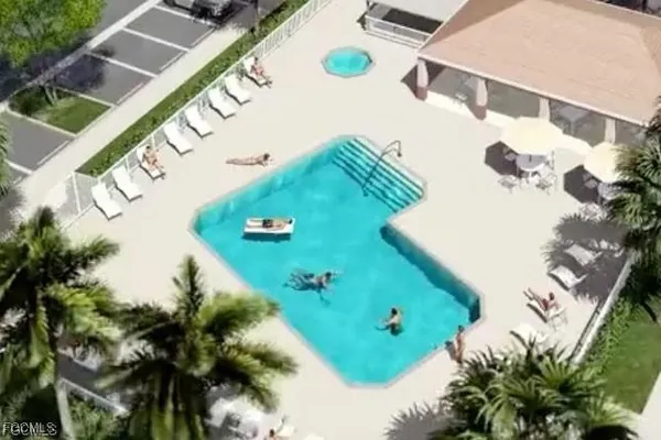 a view of a swimming pool with a patio