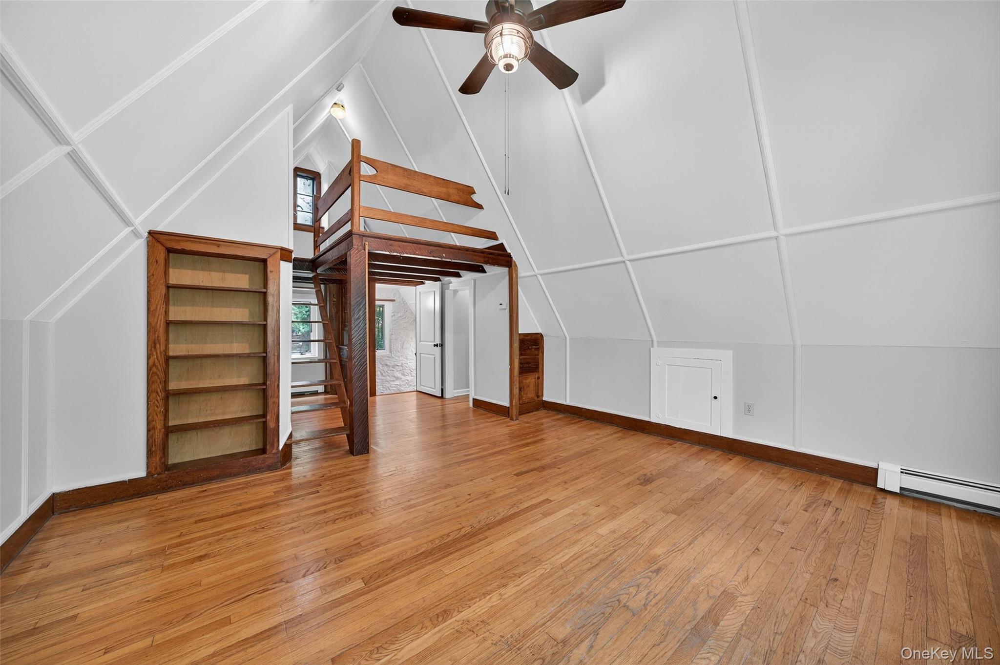 91 Sleepy Valley Road Warwick, NY 10990 - Photo 22 of 30 a view of empty room with wooden floor and fan