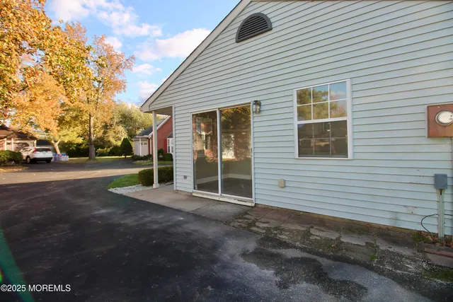 a view of a house with a street