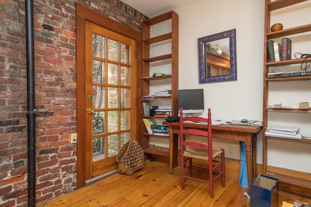 20 Grove Street Boston, MA 02114 - Photo 25 of 29 a workspace with furniture and a window