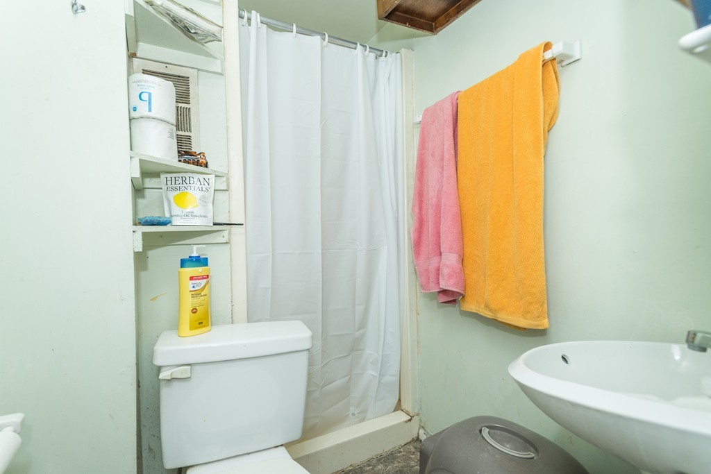 20 Grove Street Boston, MA 02114 - Photo 29 of 29 a bathroom with a sink and a bathtub