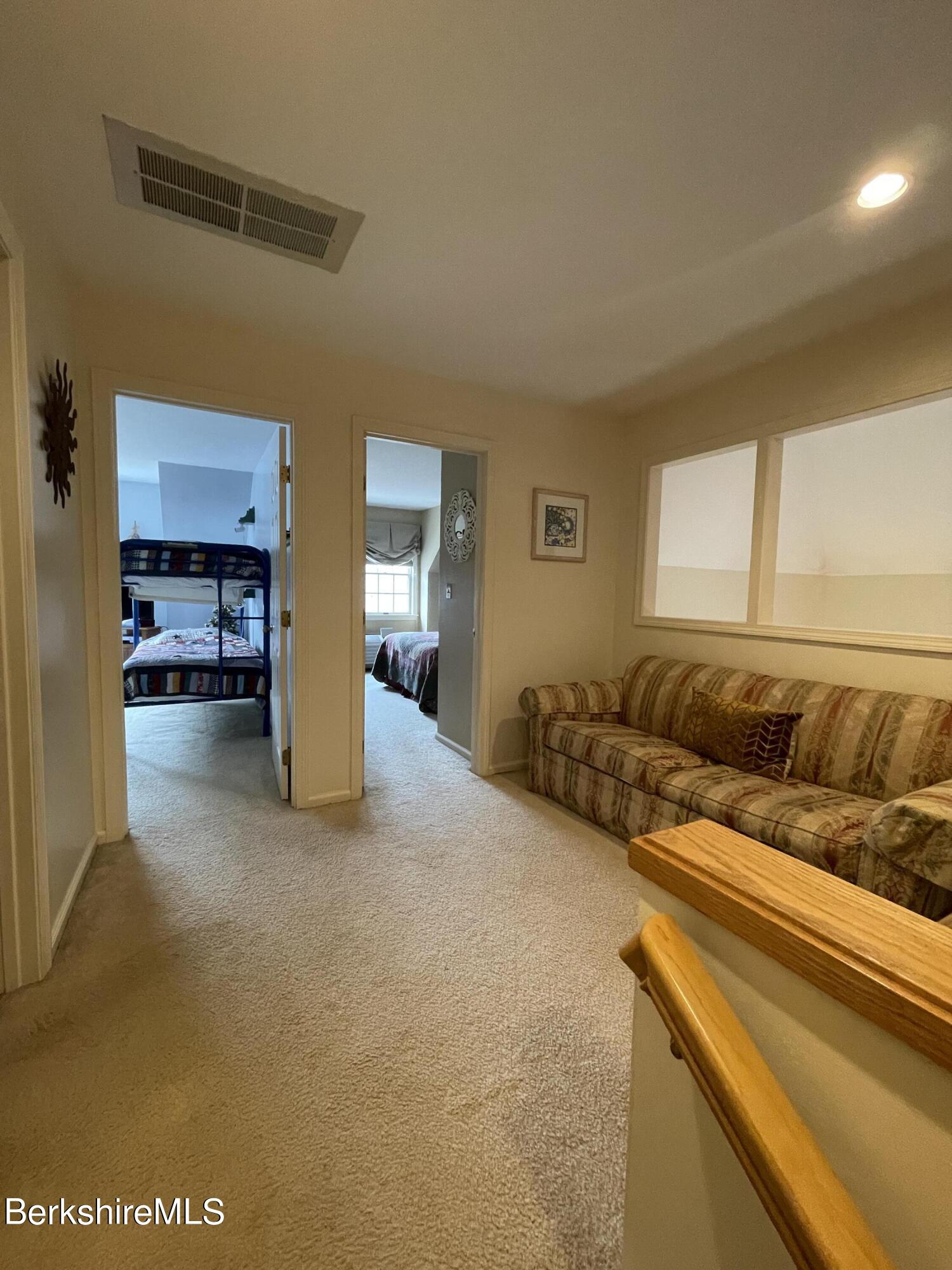37 Corey Road, Unit 822 Hancock, MA 01237 - Photo 18 of 25 a living room with furniture and a couch