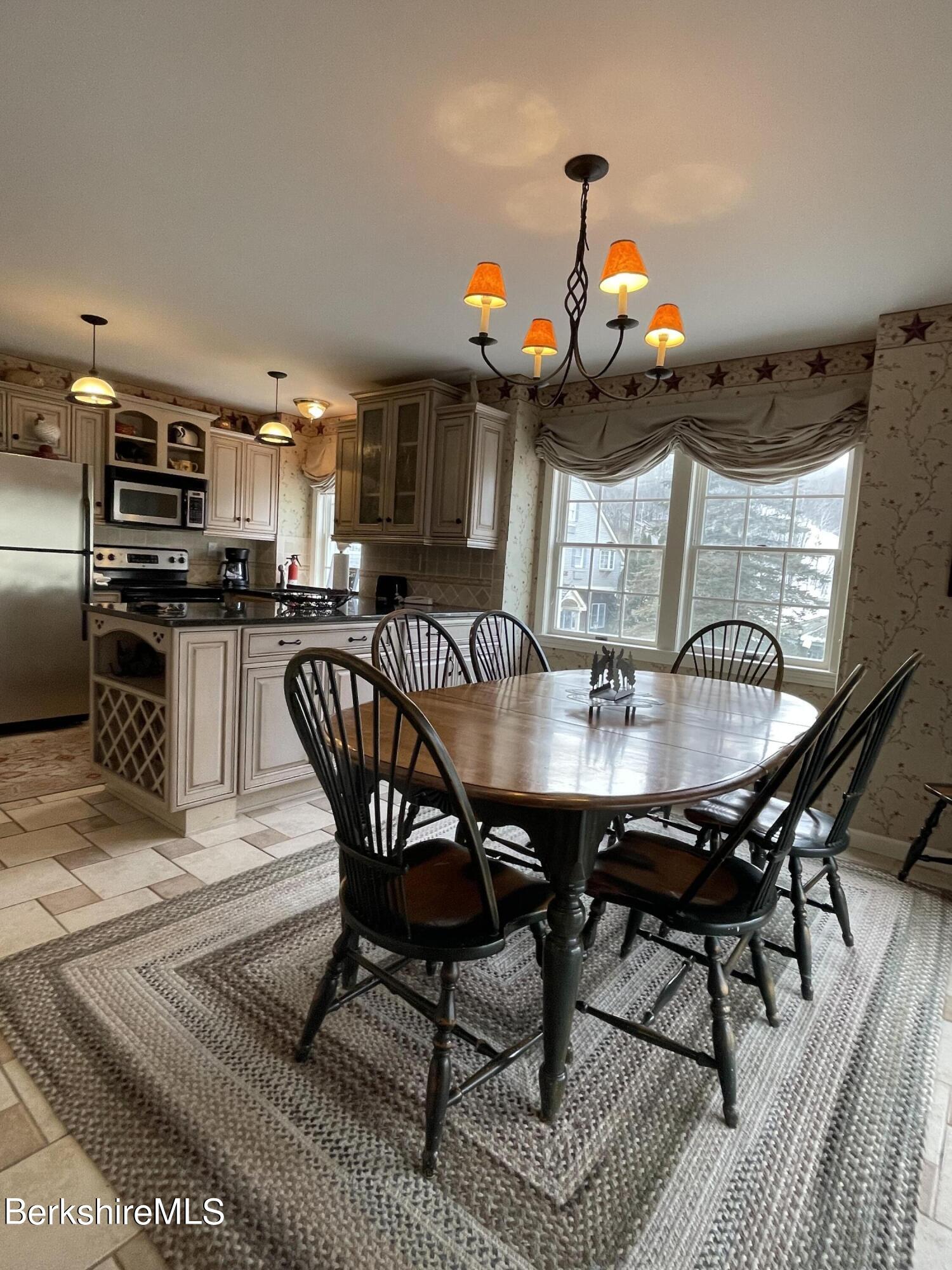 37 Corey Road, Unit 822 Hancock, MA 01237 - Photo 10 of 25 a view of a dining room with furniture