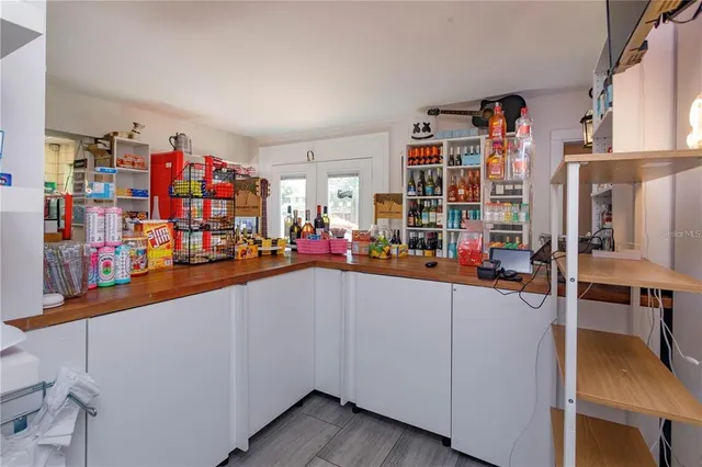a kitchen with stainless steel appliances granite countertop a sink dishwasher and cabinets