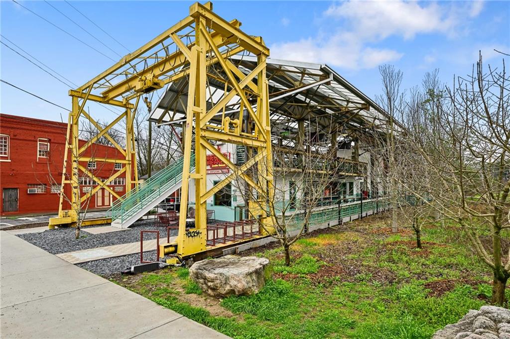 1004 Wylie Street Southeast, Unit 4 Atlanta, GA 30307 - Photo 18 of 19 front view of an house with a yard