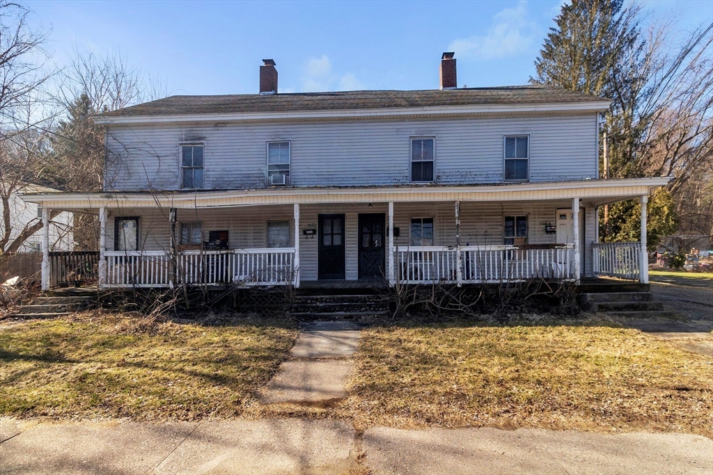 2066 Palmer Road Three Rivers, MA 01080 - Photo 1 of 17 a front view of a house with a yard