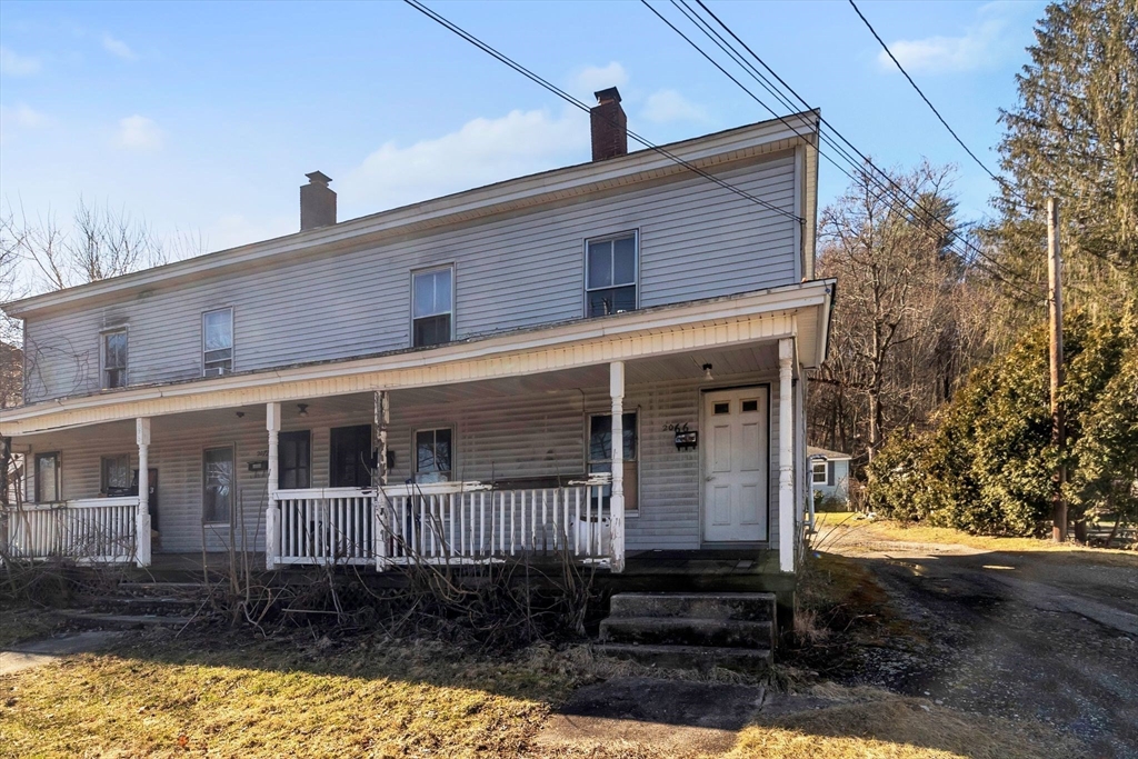 2066 Palmer Road Three Rivers, MA 01080 - Photo 14 of 17 a view of a house with backyard and garden