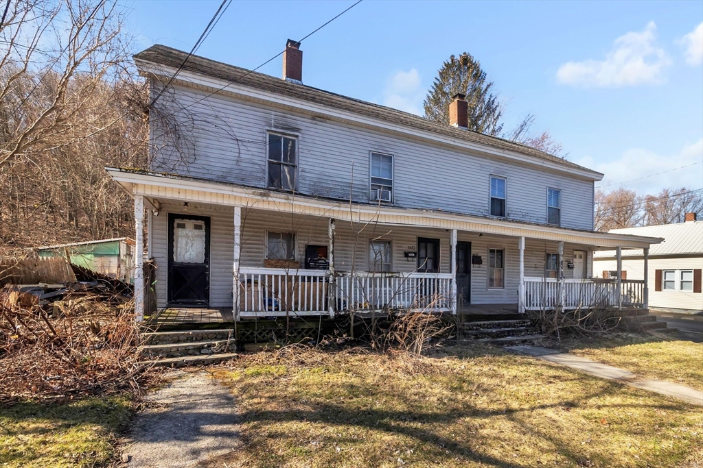 2066 Palmer Road Three Rivers, MA 01080 - Photo 16 of 17 a front view of a house with a yard