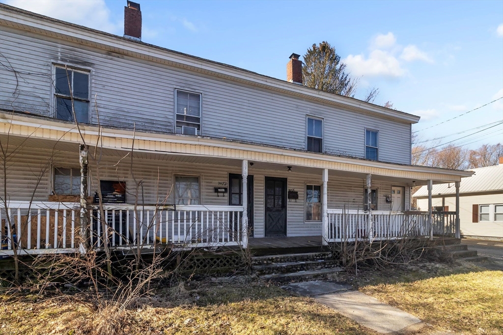 2066 Palmer Road Three Rivers, MA 01080 - Photo 2 of 17 a view of a house with a yard and plants