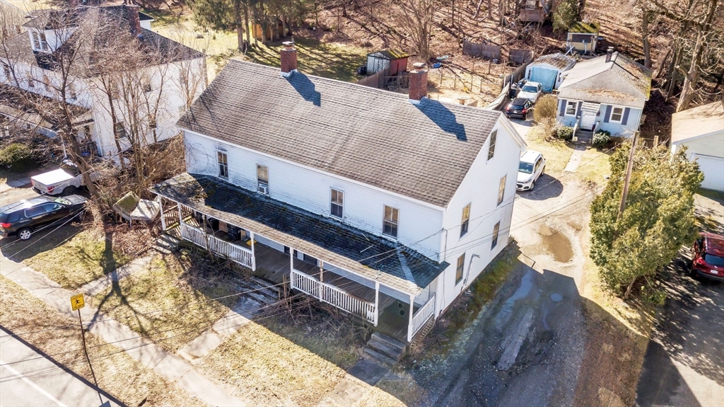 2066 Palmer Road Three Rivers, MA 01080 - Photo 4 of 17 a view of a house with a yard