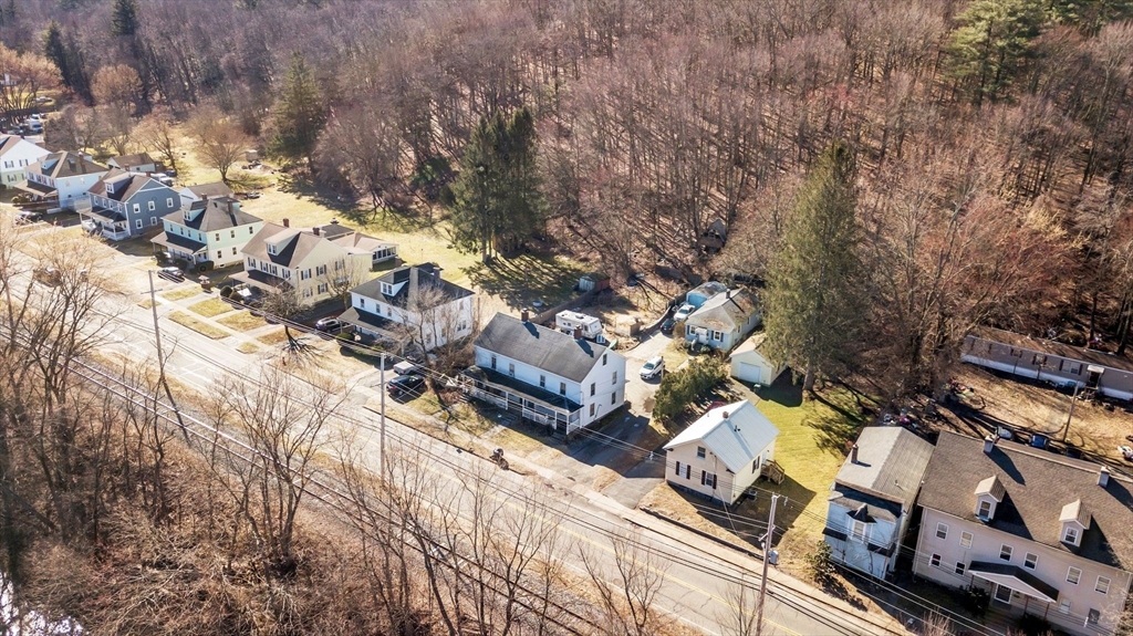 2066 Palmer Road Three Rivers, MA 01080 - Photo 7 of 17 an aerial view of multiple houses with yard