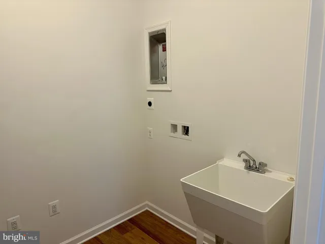 a bathroom with a sink and mirror
