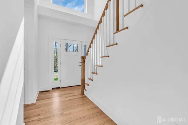 a view of entryway with wooden floor