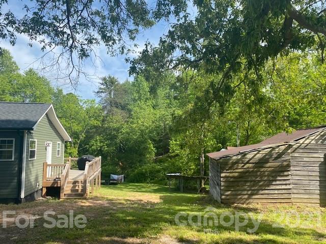 5281 Jenkins Road Morganton, NC 28655 - Photo 2 of 31 a view of a chair and tables the house in the background