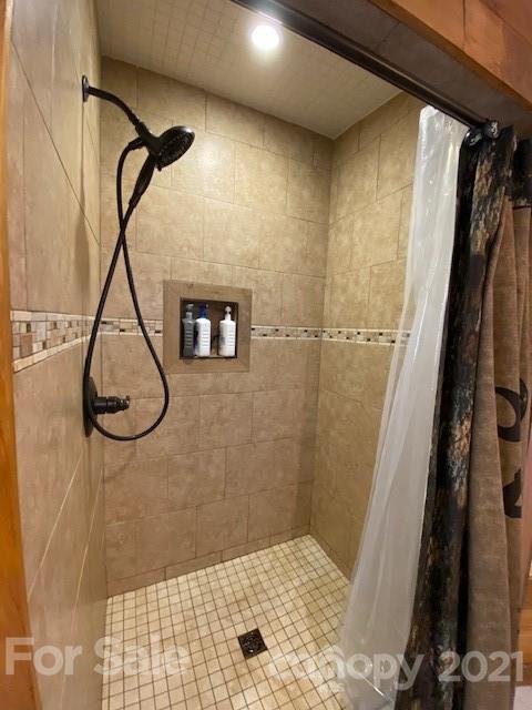 5281 Jenkins Road Morganton, NC 28655 - Photo 13 of 31 a bathroom with a shower