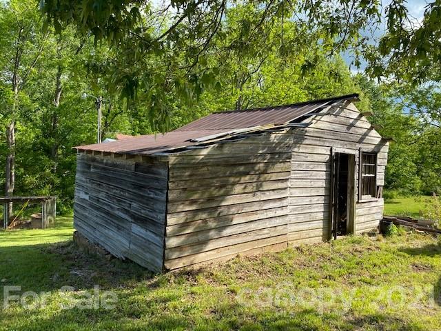 5281 Jenkins Road Morganton, NC 28655 - Photo 26 of 31 a view of a small house with a tree