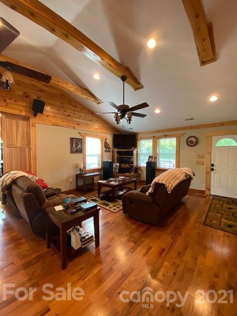 5281 Jenkins Road Morganton, NC 28655 - Photo 8 of 31 a living room with furniture a flat screen tv and a window