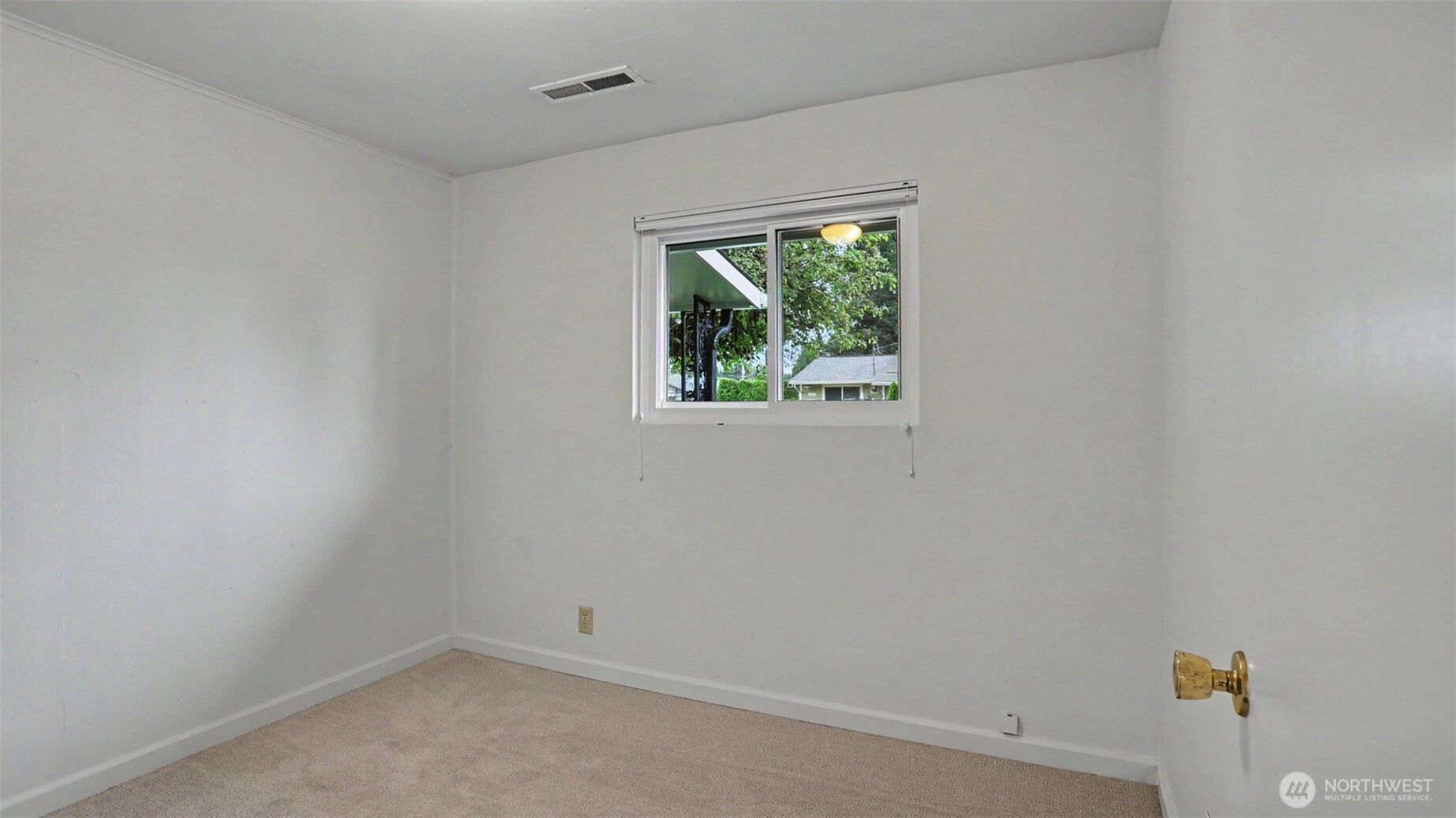 12515 Southeast 171st Street Renton, WA 98058 - Photo 19 of 24 an empty room with a window
