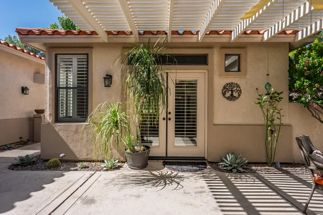 a bathroom with a sink a mirror and a bathtub