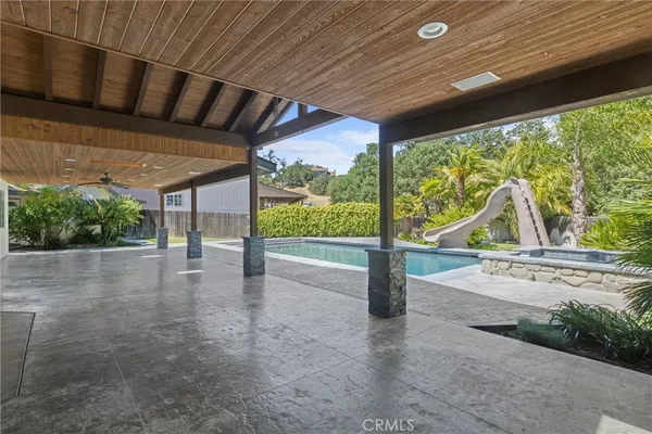 a kitchen with a sink stainless steel appliances and cabinets