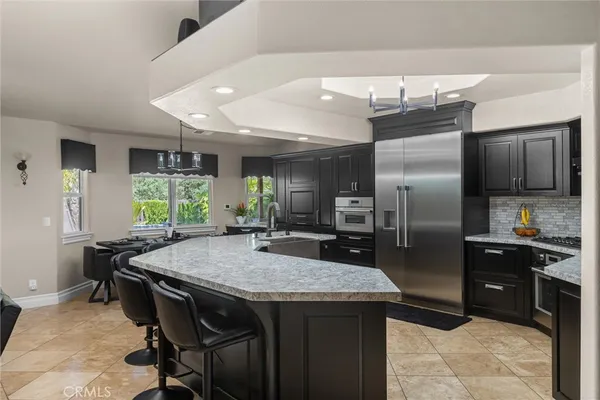 a bedroom with a bed and flat screen tv