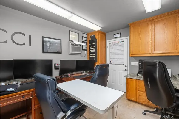 a garden with wooden fence