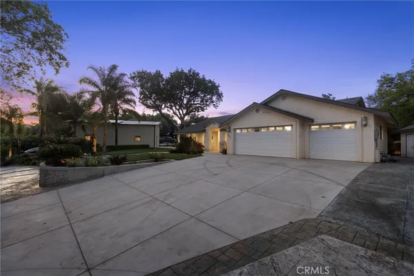 a view of a backyard with a tub and sink