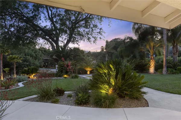 a view of swimming pool with outdoor seating