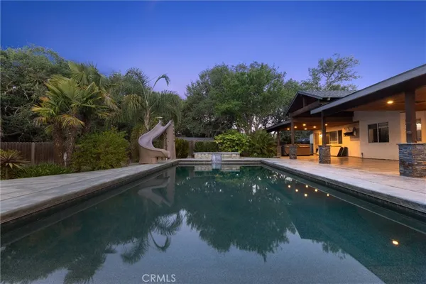 an aerial view of a house with a garden
