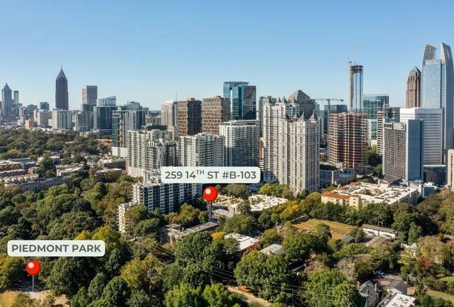 a view of a city with tall buildings