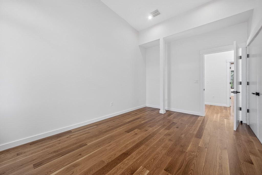 15 Bird Hill Road Lexington, MA 02421 - Photo 27 of 34 a view of wooden floor in an empty room