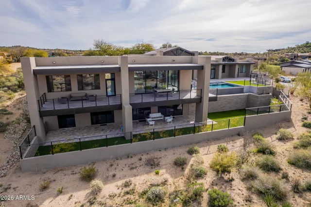 a view of a house with a swimming pool